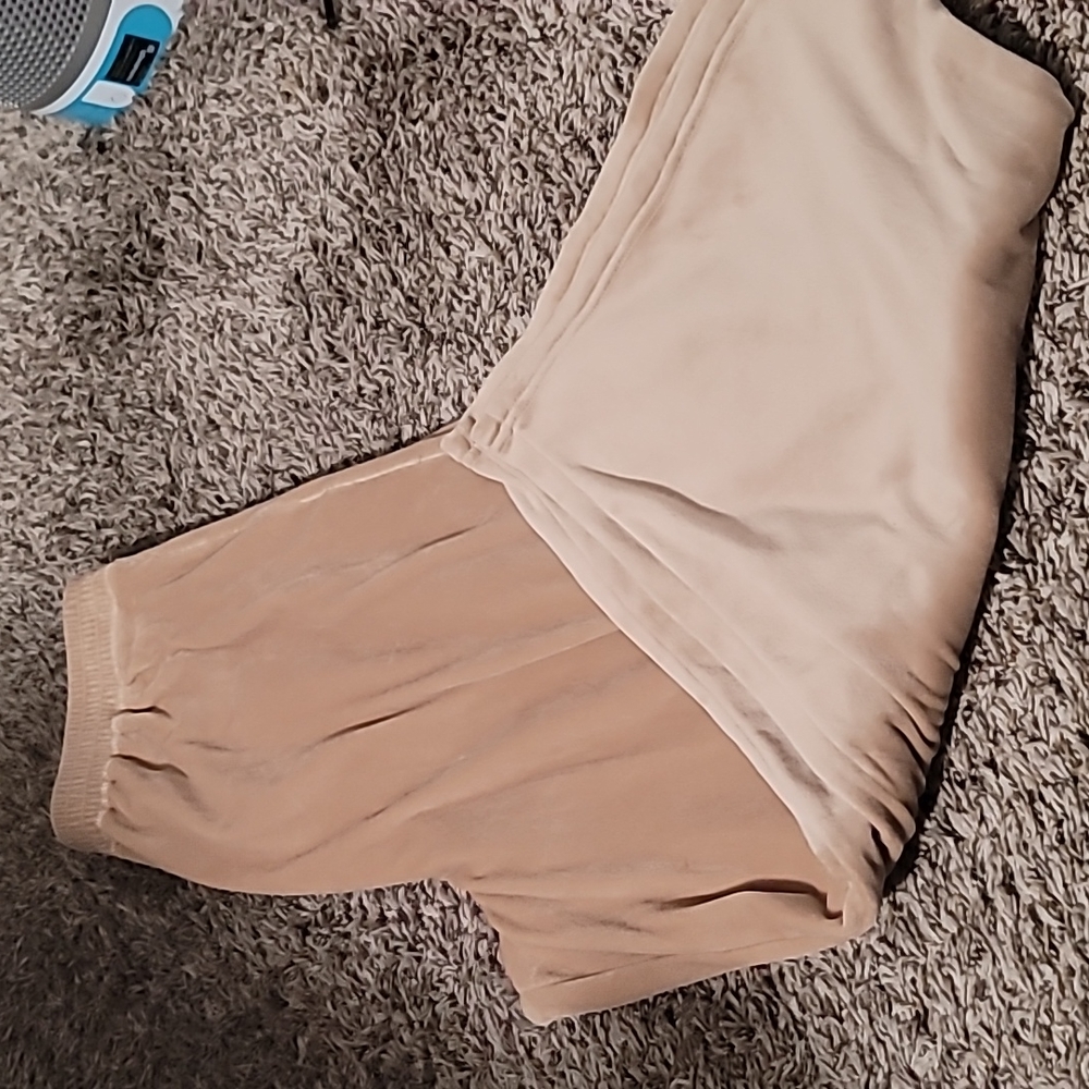 Skims velour wide leg pant in the color HONEY